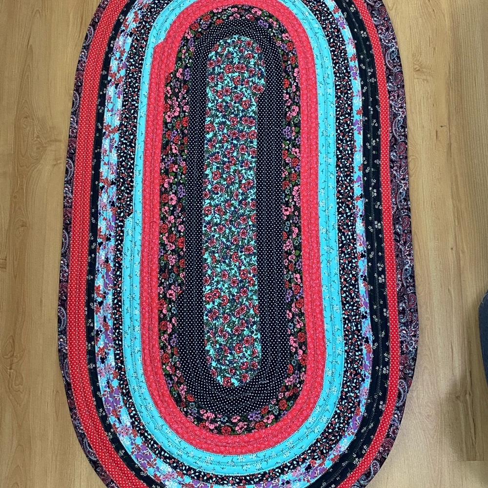 Oval Floral Jelly Roll Rug in Red, Black & Turquoise